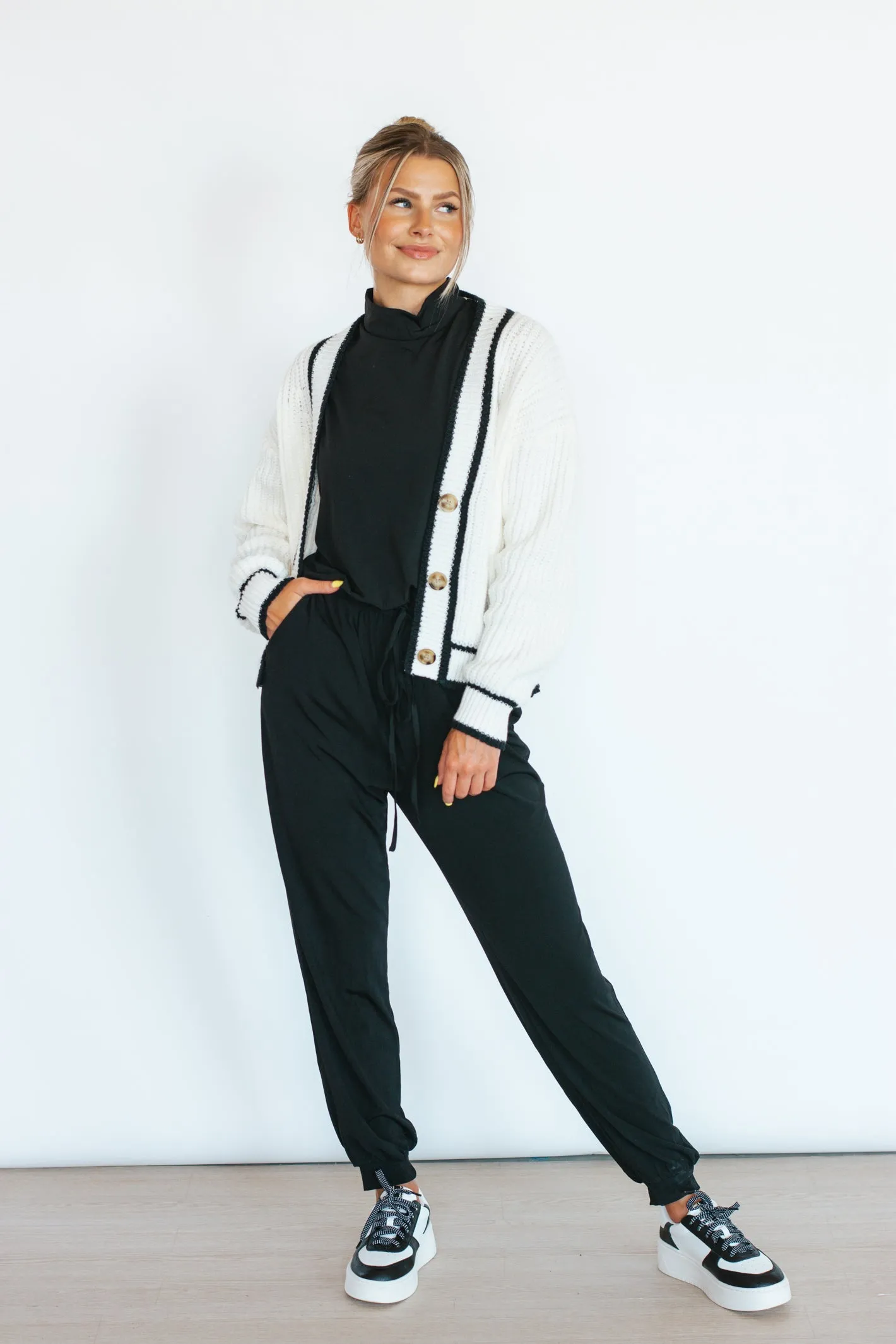 Doing Just Fine Black Mock Neck Jumpsuit